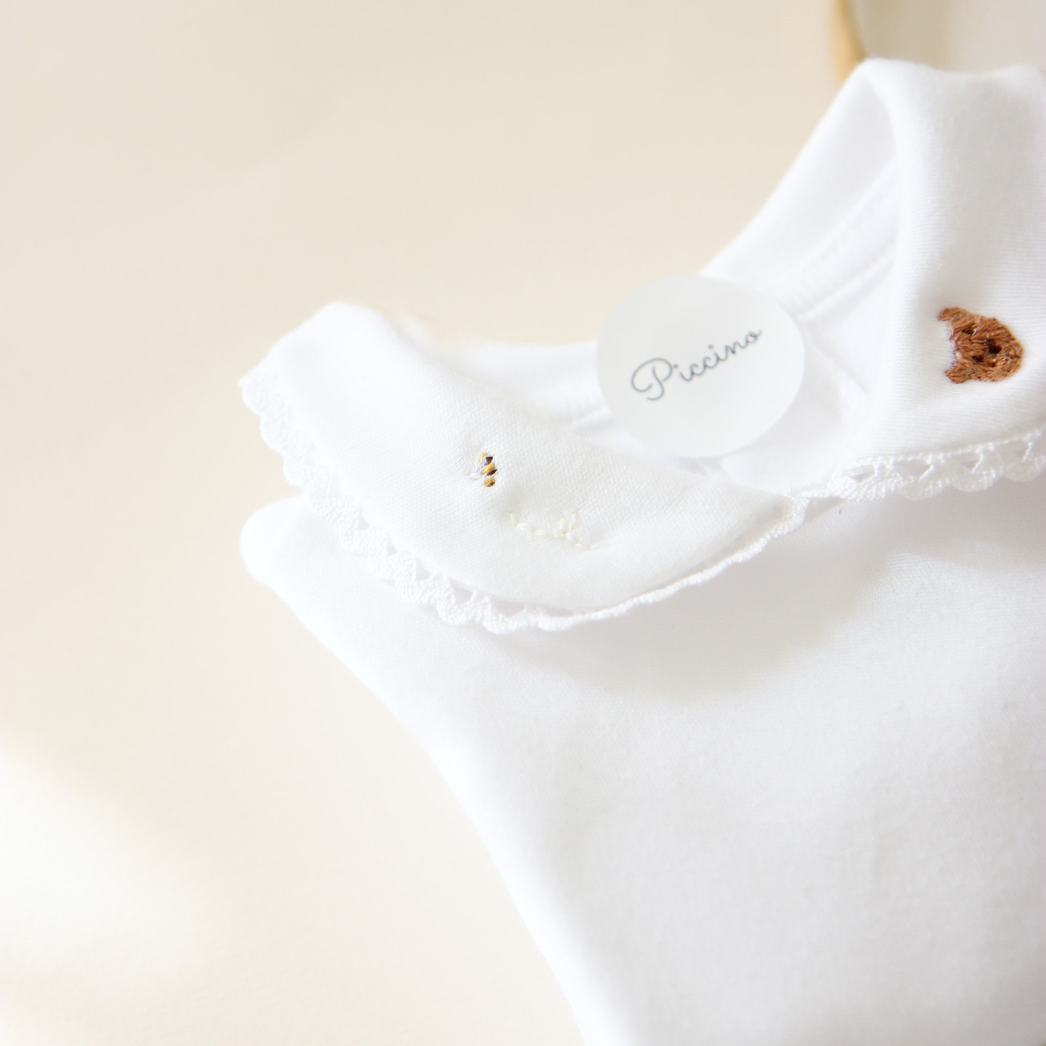 Bodysuit with long sleeve collar