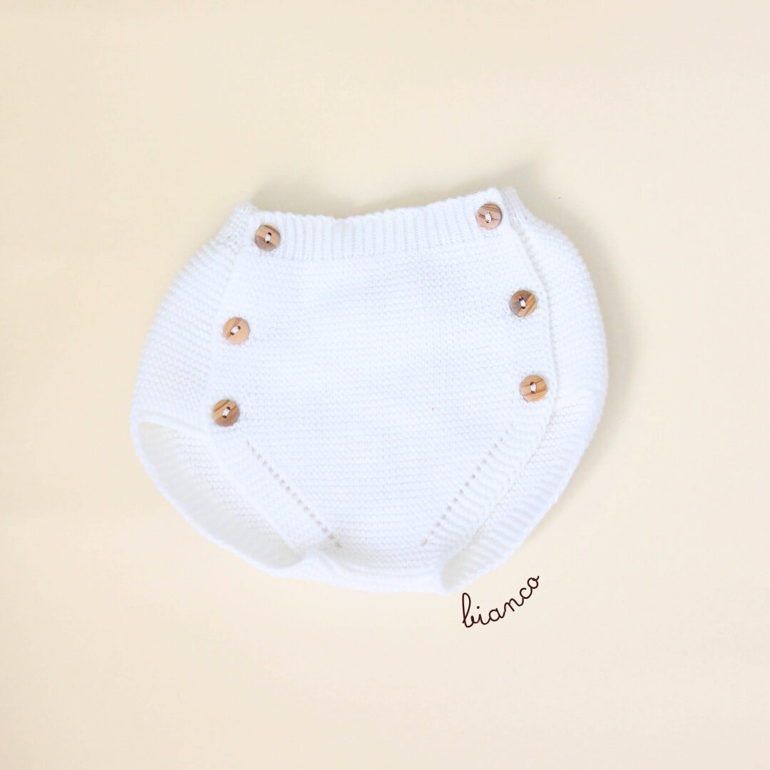 Copripannolino in maglia artigianale