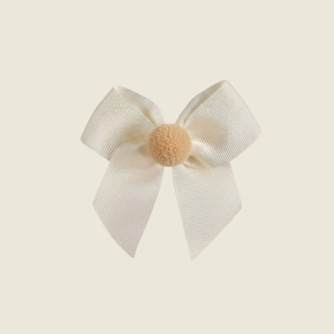 Fermaglio capelli con fiocco ponpon panna - Piccino store