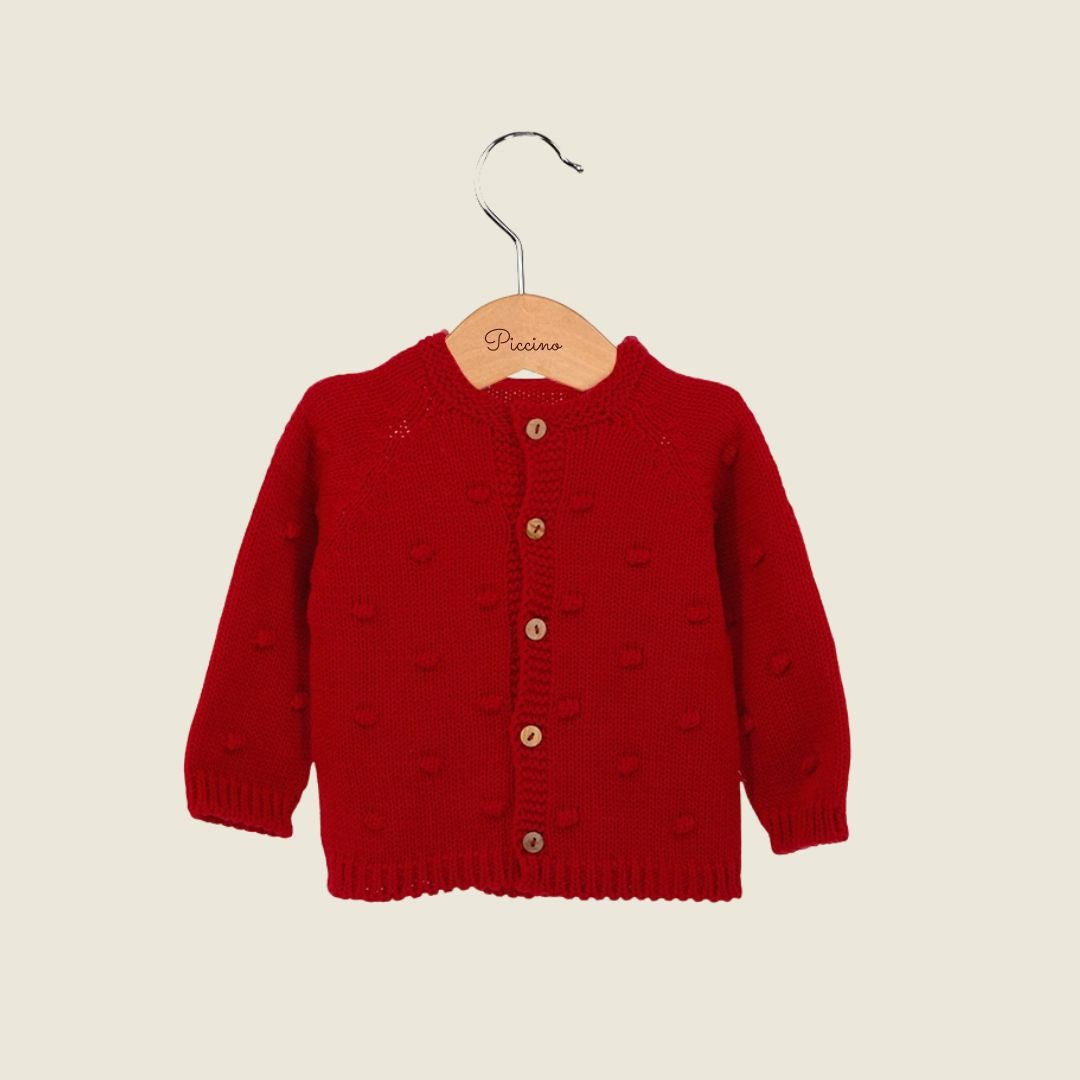 Cardigan rosso con pon pon - Piccino store